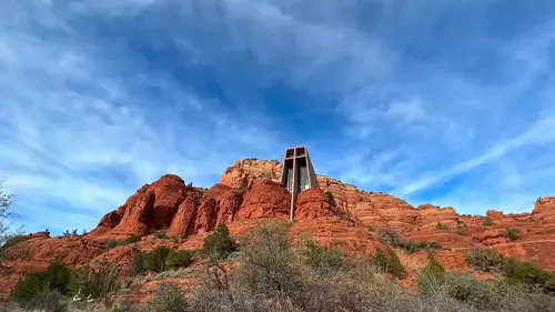 Aura-like clouds surround Chapel of the Holy Cross, Sedona, Arizona